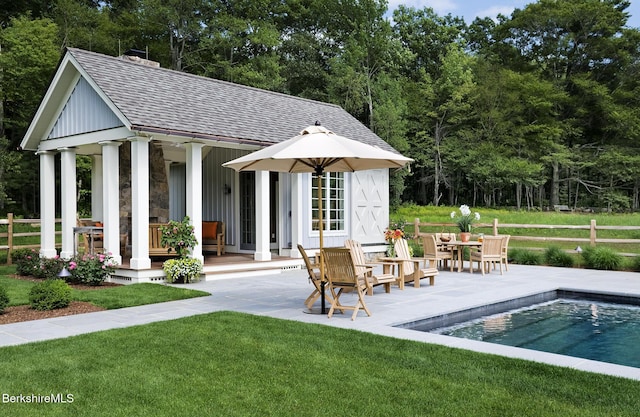 258 Sandisfield Rd, New Marlborough, MA 01230 - swimming pool featuring an exterior structure, an outbuilding, and a patio
