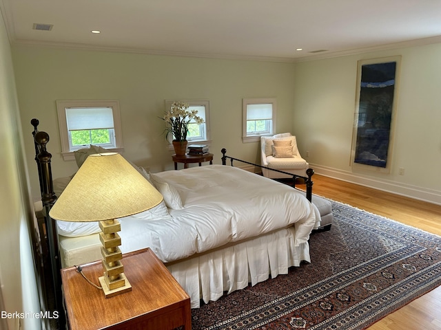 258 Sandisfield Rd, New Marlborough, MA 01230 - bedroom featuring crown molding, wood finished floors, baseboards, and recessed lighting
