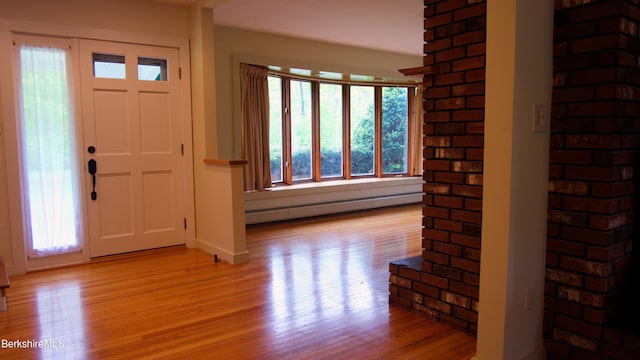 366 Clough Rd, Stamford, VT 05352 - foyer featuring light wood-style flooring, a baseboard heating unit, and baseboards
