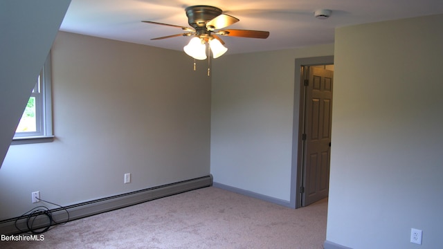 366 Clough Rd, Stamford, VT 05352 - spare room with a baseboard heating unit, a smoke detector, carpet, a ceiling fan, and baseboards