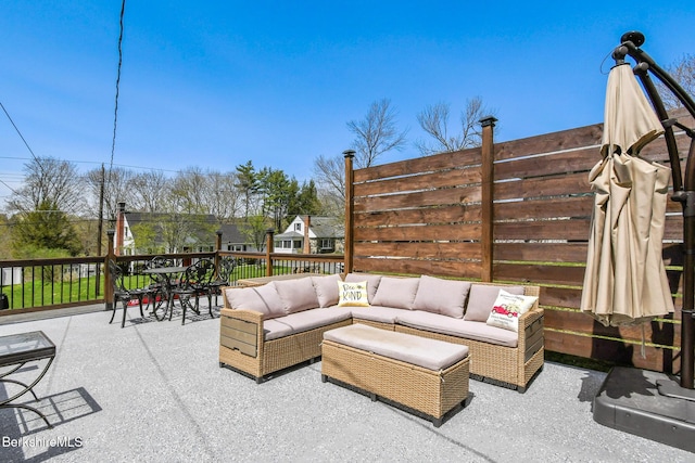view of patio featuring outdoor dining space and outdoor lounge area