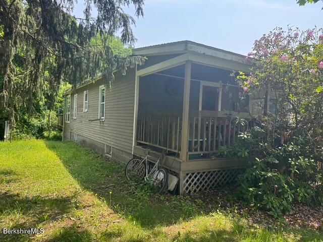 386 N Plain Rd, Great Barrington, MA 01230 - view of side of home with a wooden deck