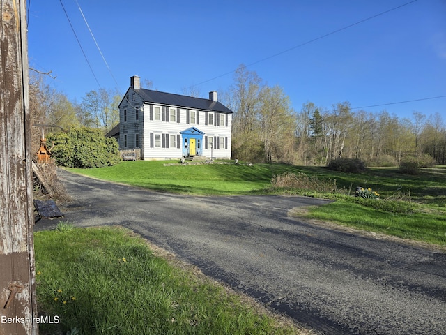 332 W Rd, Adams, MA 01220 - colonial-style house with a chimney, a front yard, and entry steps