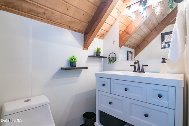 78 Slope Rd, Tolland, MA 01034 - half bath with wooden ceiling, vanity, toilet, and baseboards