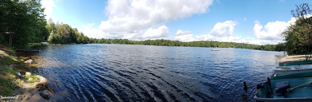 78 Slope Rd, Tolland, MA 01034 - water view featuring a heavily wooded area