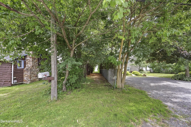 7 Chicopee St, Lanesborough, MA 01237 - view of grassy yard featuring driveway
