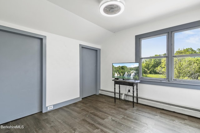 20 E Dugway Rd, Lenox, MA 01240 - spare room with baseboard heating, lofted ceiling, and wood finished floors