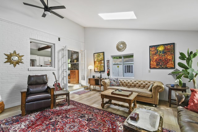 20 E Dugway Rd, Lenox, MA 01240 - living room with wood finished floors, a ceiling fan, a skylight, healthy amount of natural light, and high vaulted ceiling
