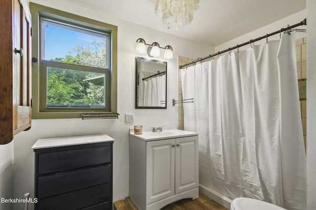 20 E Dugway Rd, Lenox, MA 01240 - bathroom featuring vanity, wood finished floors, and a chandelier