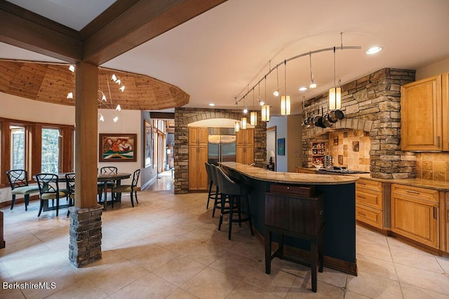 116 Brush Hill Rd, Great Barrington, MA 01230 - indoor bar featuring decorative columns, light tile patterned floors, tasteful backsplash, arched walkways, and recessed lighting