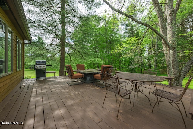 33 Interlaken Rd, Stockbridge, MA 01262 - wooden deck with a grill and a fire pit