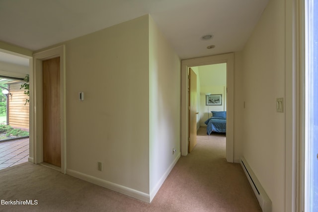 33 Interlaken Rd, Stockbridge, MA 01262 - hallway with baseboard heating and light colored carpet