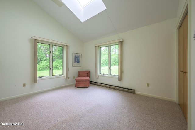 33 Interlaken Rd, Stockbridge, MA 01262 - carpeted empty room featuring a baseboard heating unit, a skylight, and high vaulted ceiling