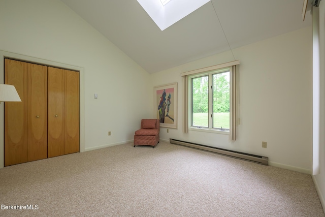 33 Interlaken Rd, Stockbridge, MA 01262 - unfurnished room with a baseboard heating unit, a skylight, carpet flooring, and high vaulted ceiling