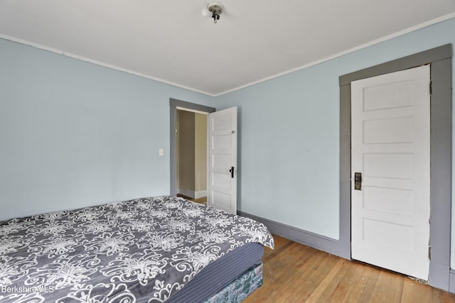 495 Main St, Williamstown, MA 01267 - bedroom featuring baseboards, ornamental molding, and hardwood / wood-style flooring
