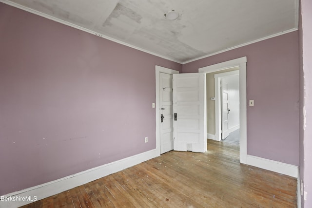 495 Main St, Williamstown, MA 01267 - spare room featuring crown molding, baseboards, and hardwood / wood-style flooring