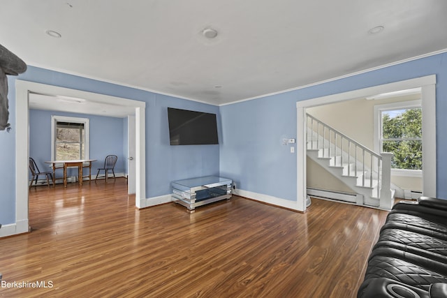 495 Main St, Williamstown, MA 01267 - living area with a baseboard radiator, wood finished floors, and crown molding