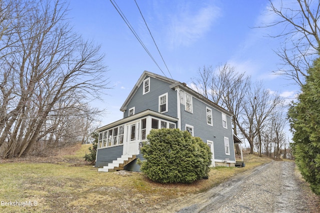 495 Main St, Williamstown, MA 01267 - view of side of home featuring a sunroom