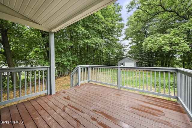 32 Hampshire St, Pittsfield, MA 01201 - wooden terrace with view of scattered trees and a shed