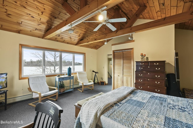 bedroom with carpet floors, lofted ceiling with beams, track lighting, and wood ceiling