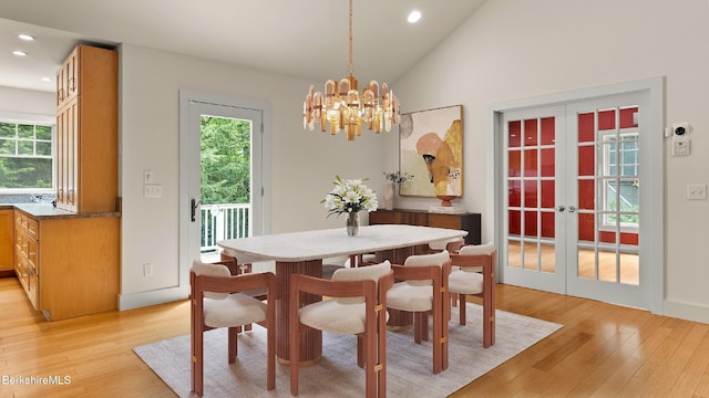 2017 Monterey Rd, Otis, MA 01253 - dining area featuring french doors, light wood-type flooring, a chandelier, recessed lighting, and lofted ceiling