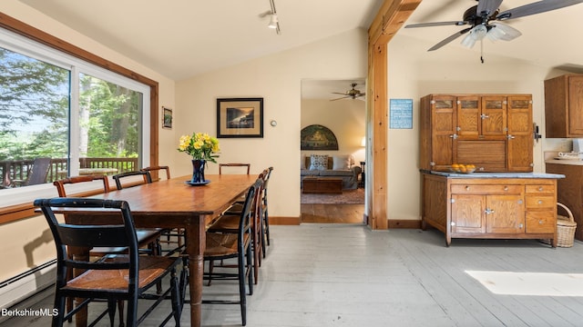 51 Downs Rd, New Marlborough, MA 01230 - dining space with lofted ceiling, a ceiling fan, light wood-style flooring, and a baseboard radiator