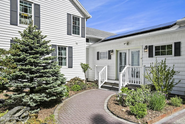288 Johnson Rd, Dalton, MA 01226 - doorway to property featuring roof mounted solar panels and french doors