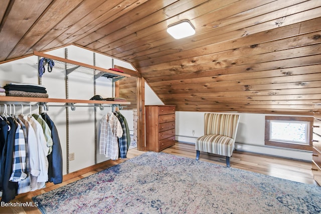 288 Johnson Rd, Dalton, MA 01226 - walk in closet with vaulted ceiling, wood finished floors, and baseboard heating