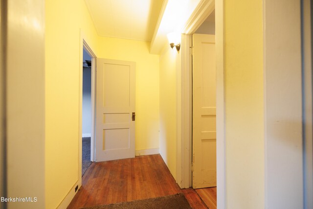 corridor with wood finished floors