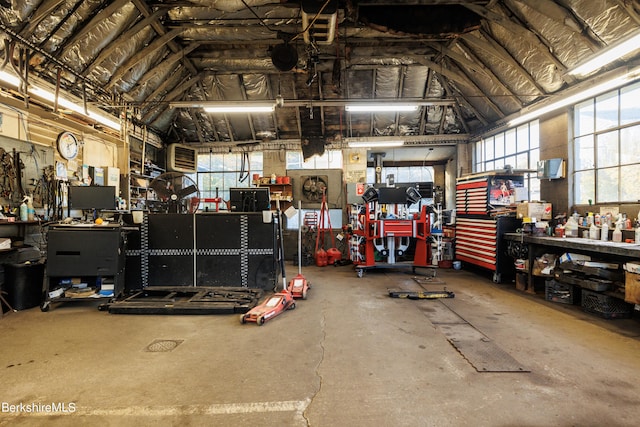 garage with a workshop area