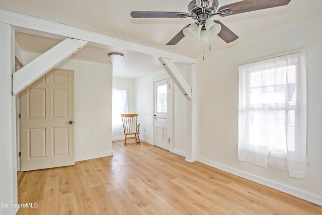 additional living space with ceiling fan and light hardwood / wood-style floors