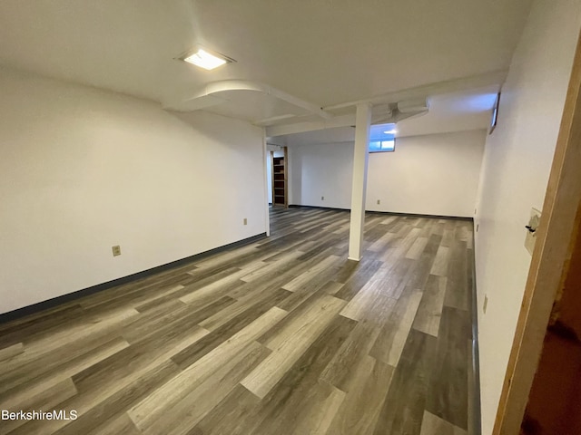 basement featuring hardwood / wood-style flooring