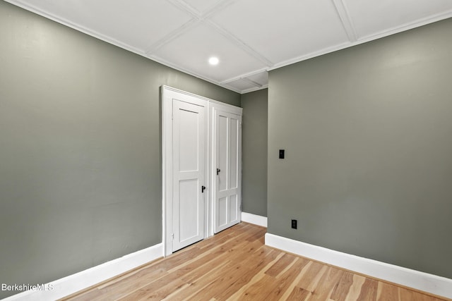 unfurnished room featuring baseboards, light wood-style flooring, and recessed lighting