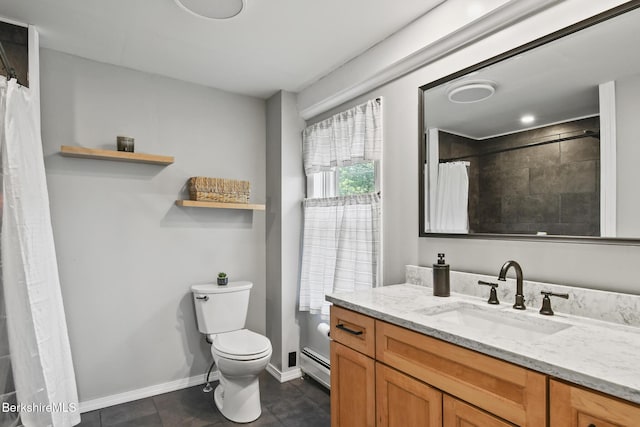 full bath featuring a baseboard heating unit, tile patterned floors, toilet, vanity, and baseboards