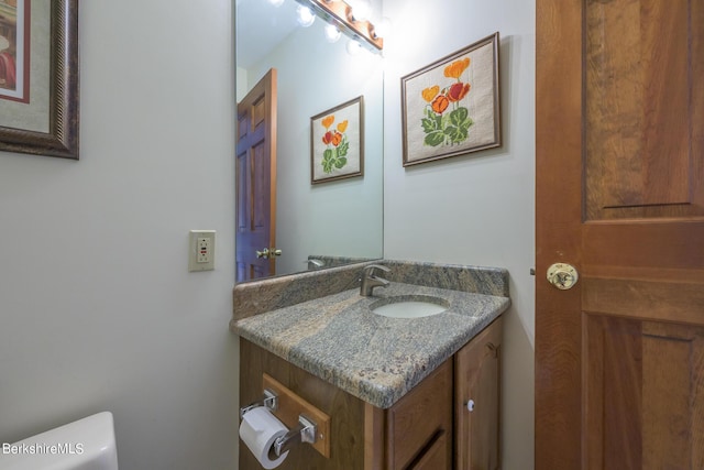 26 Filomena Dr, Pittsfield, MA 01201 - half bath with vanity and toilet