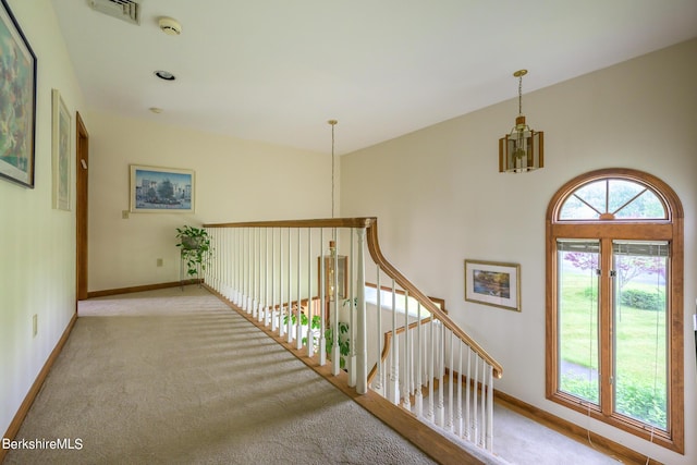 26 Filomena Dr, Pittsfield, MA 01201 - corridor featuring carpet floors and a chandelier