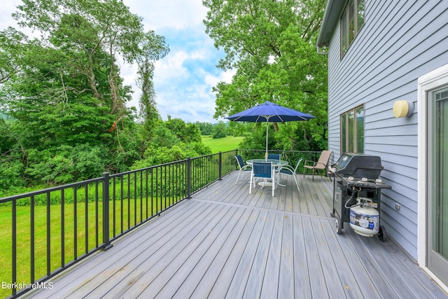 26 Filomena Dr, Pittsfield, MA 01201 - wooden deck featuring outdoor dining area, grilling area, a lawn, and view of scattered trees
