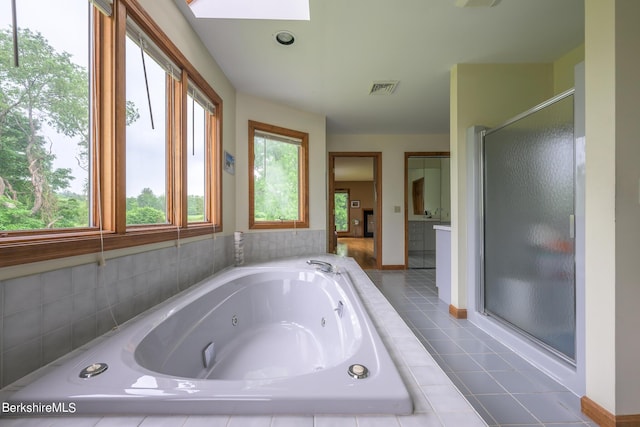 26 Filomena Dr, Pittsfield, MA 01201 - bathroom with a stall shower, a jetted tub, and tile patterned flooring