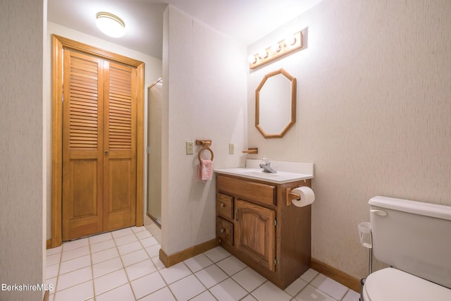 26 Filomena Dr, Pittsfield, MA 01201 - bathroom with vanity, a shower stall, tile patterned floors, and a closet