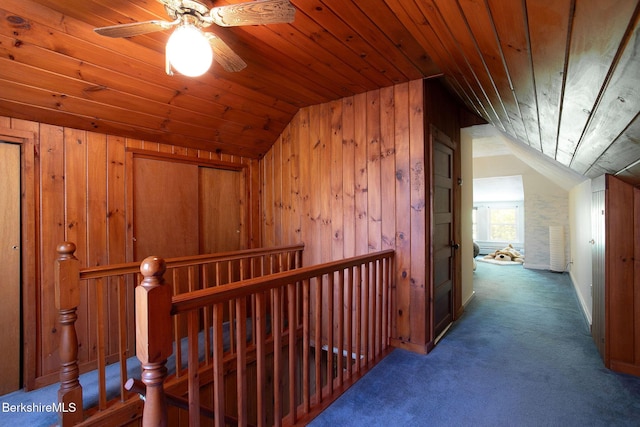 567 S Main St, Sheffield, MA 01257 - hall featuring an upstairs landing, vaulted ceiling, carpet flooring, wood walls, and wood ceiling