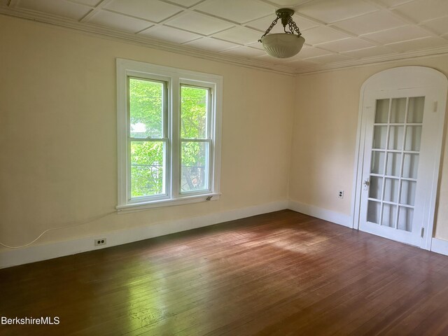 21 Goodrich St, Pittsfield, MA 01201 - empty room with healthy amount of natural light, dark wood-type flooring, baseboards, and crown molding