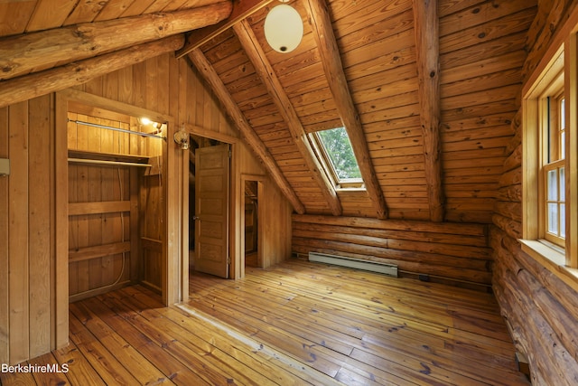 40 Silver St, Lanesborough, MA 01237 - additional living space featuring a skylight, a baseboard heating unit, wood ceiling, and wood-type flooring