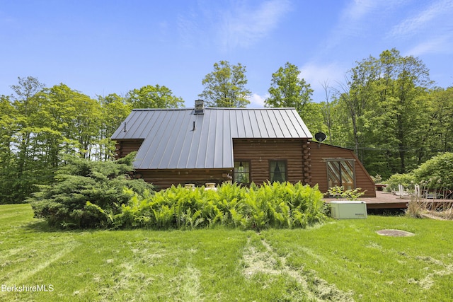 40 Silver St, Lanesborough, MA 01237 - view of side of property featuring log exterior, a chimney, a standing seam roof, a yard, and a deck
