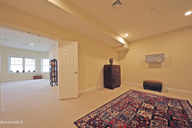 interior space featuring recessed lighting, carpet floors, visible vents, and baseboards