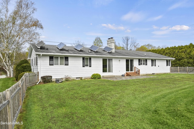 75 E Rd, Adams, MA 01220 - back of property featuring a chimney, a fenced backyard, a yard, a patio, and entry steps