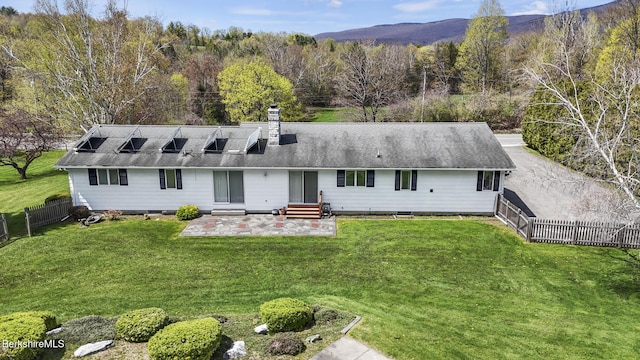 75 E Rd, Adams, MA 01220 - back of house featuring a chimney, a lawn, a patio area, a fenced backyard, and entry steps