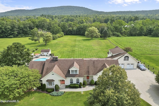 birds eye view of property featuring a mountain view