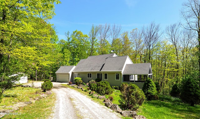 232 Harrington Rd, Otis, MA 01253 - view of front of property with driveway, an attached garage, and a shingled roof