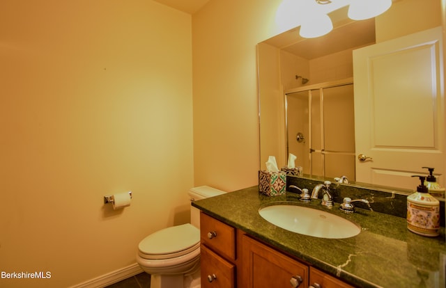 232 Harrington Rd, Otis, MA 01253 - full bathroom featuring a stall shower, toilet, and vanity