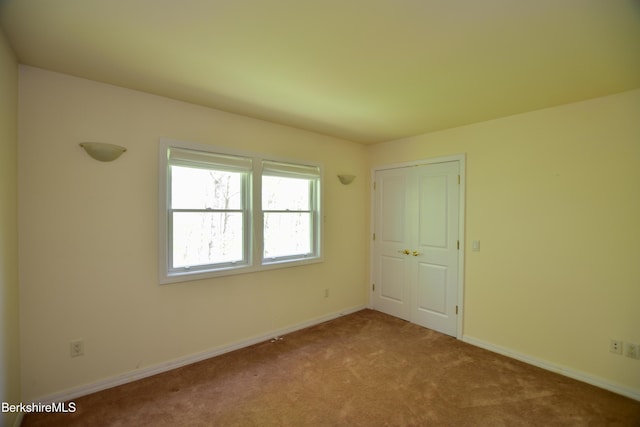 232 Harrington Rd, Otis, MA 01253 - carpeted spare room featuring baseboards